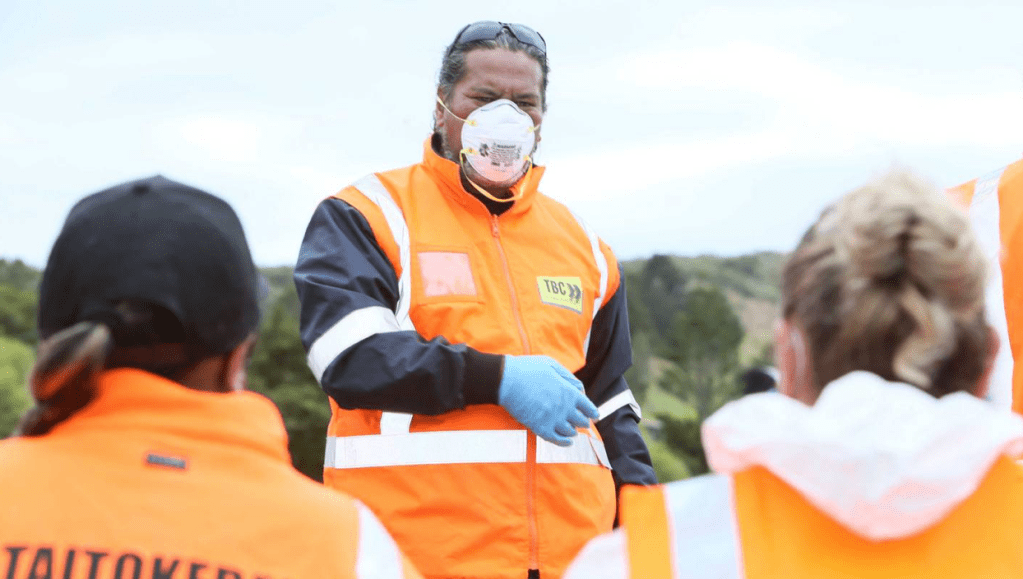 Maori man in a high vis jacket
